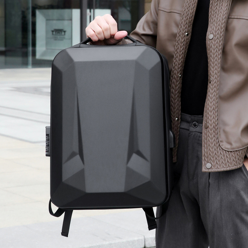 Mochila de corte de cáscara dura para hombres 2025 gran capacidad USB colgar varilla de tracción a prueba de rociamientos mochila de negocios al por mayor