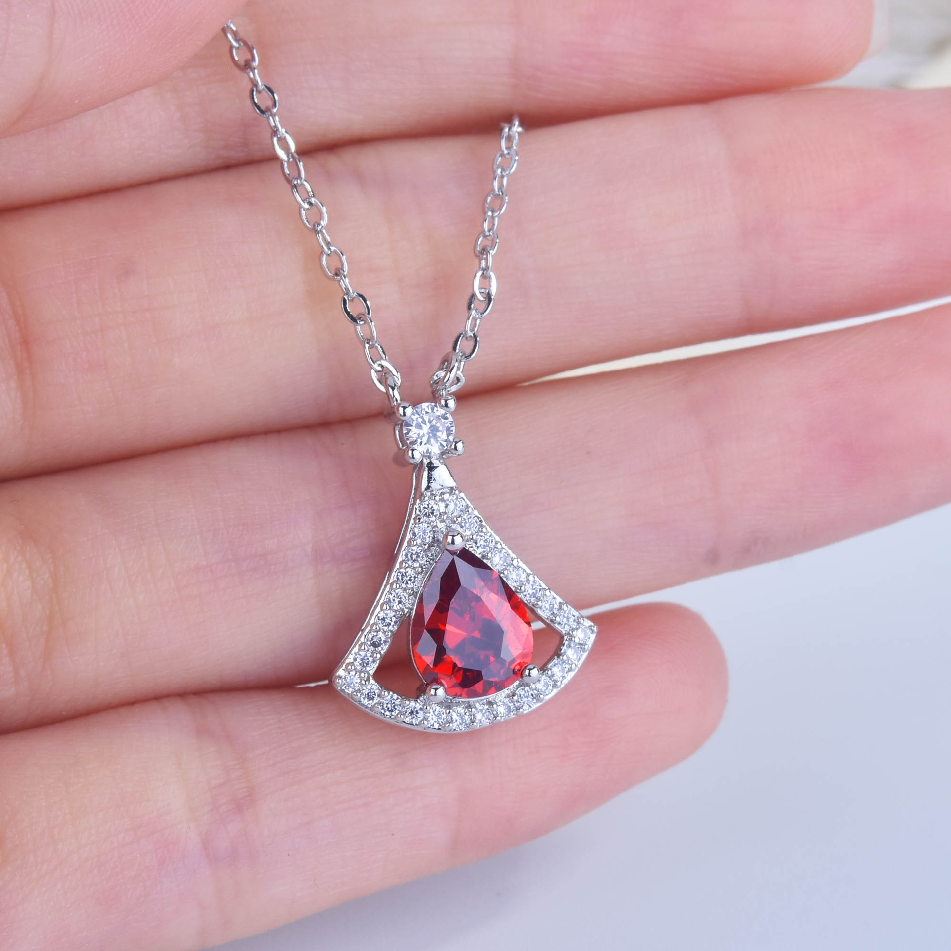 New Garnet Zircon Small Skirt Pendant Micro-inlaid Full Diamond Simulation Pigeons-blood Ruby Colored Gems Fan-shaped Necklace display picture 5