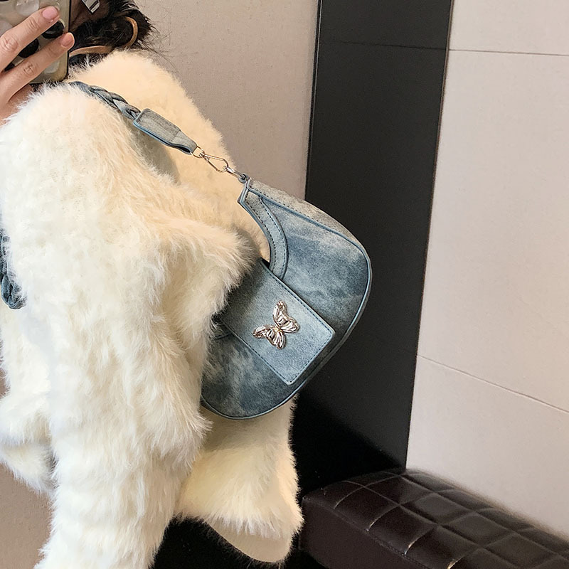Bolsos de nicho populares para mujer 2024 invierno nueva cadena de moda simple bolso de hombro casual coreano bolso de luna nueva para mujer