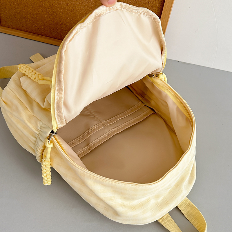 Mochila nueva mochila de todo fósforo, estudiante de secundaria japonesa, estudiante de secundaria, bolso de estudiante de viaje, versión coreana, mochila de color sólido simple al por mayor