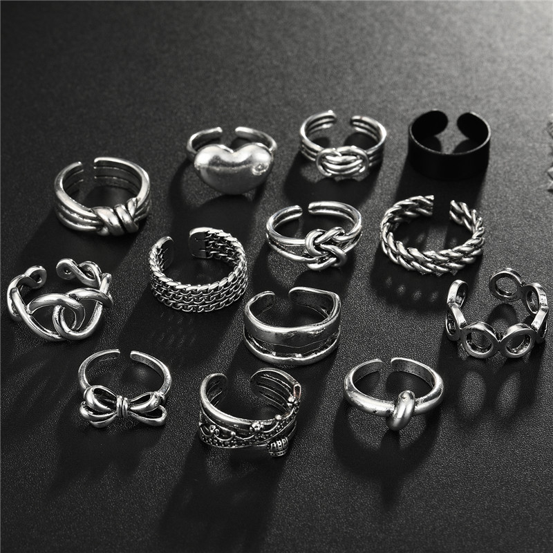 Fashion Geometric Bow Smooth Hollow Metal Ring display picture 14