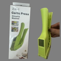 国境を越えたステンレスの二合一手動にんにく器ニンニク器多機能にんにく器ニンニク器家庭用にんにく蓉圧