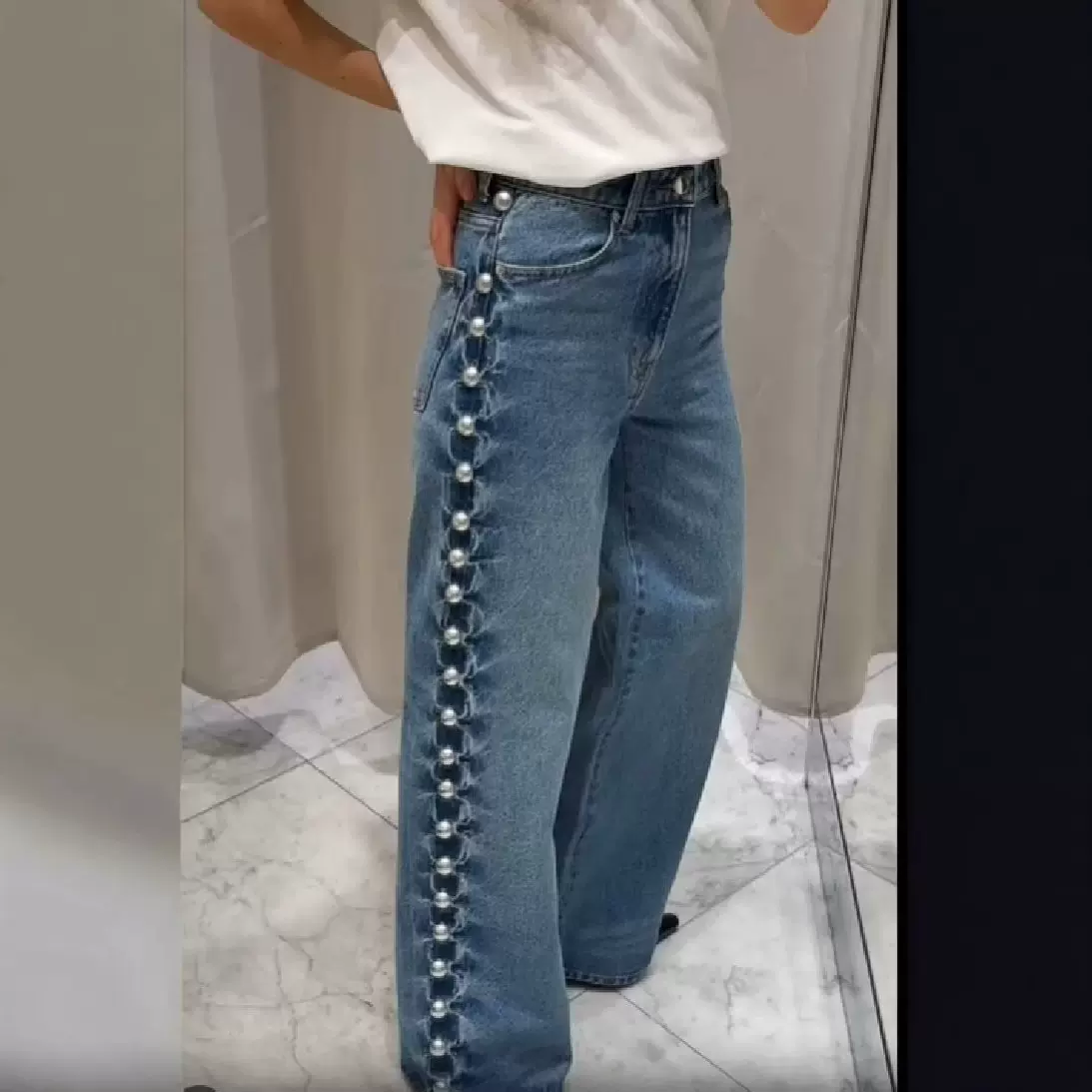 跨境欧美女装速卖通INS爆款侧边重工圆珠铆钉装饰洗水牛仔裤