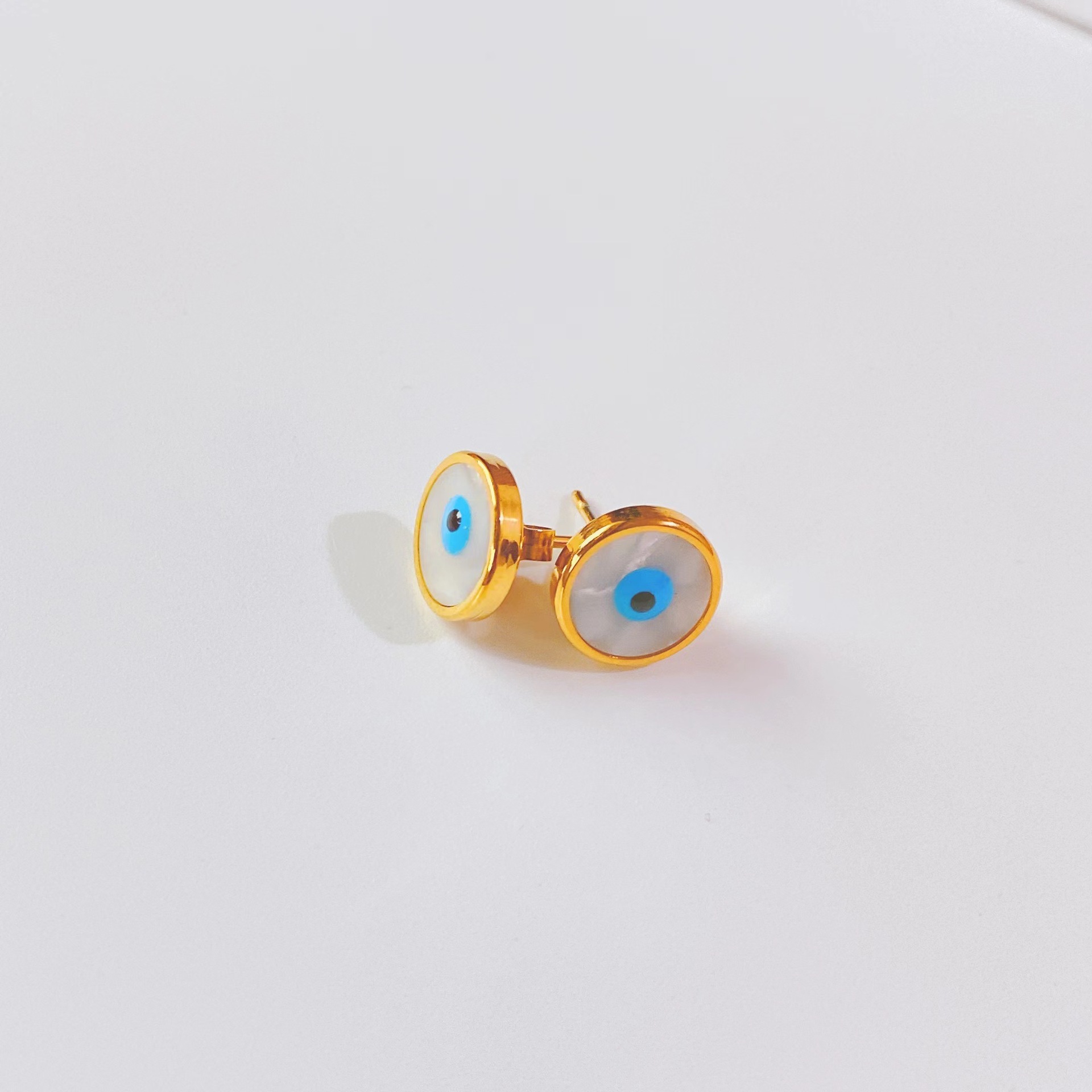 fashion trend new titanium steel gold simple eye shape earrings