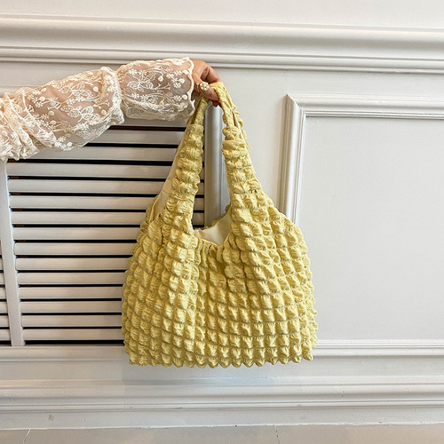 This year's popular fashion simple temperament commuter pleated bag women's  single shoulder armpit bag portable bucket bag trend