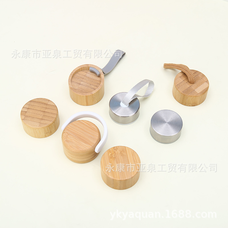 Fabricante suministro de copas de vidrio de alta borosilicina de bambú cubierta de vidrio de automóvil doméstico taza de bebida directa con cubierta de silicona taza de regalo al por mayor