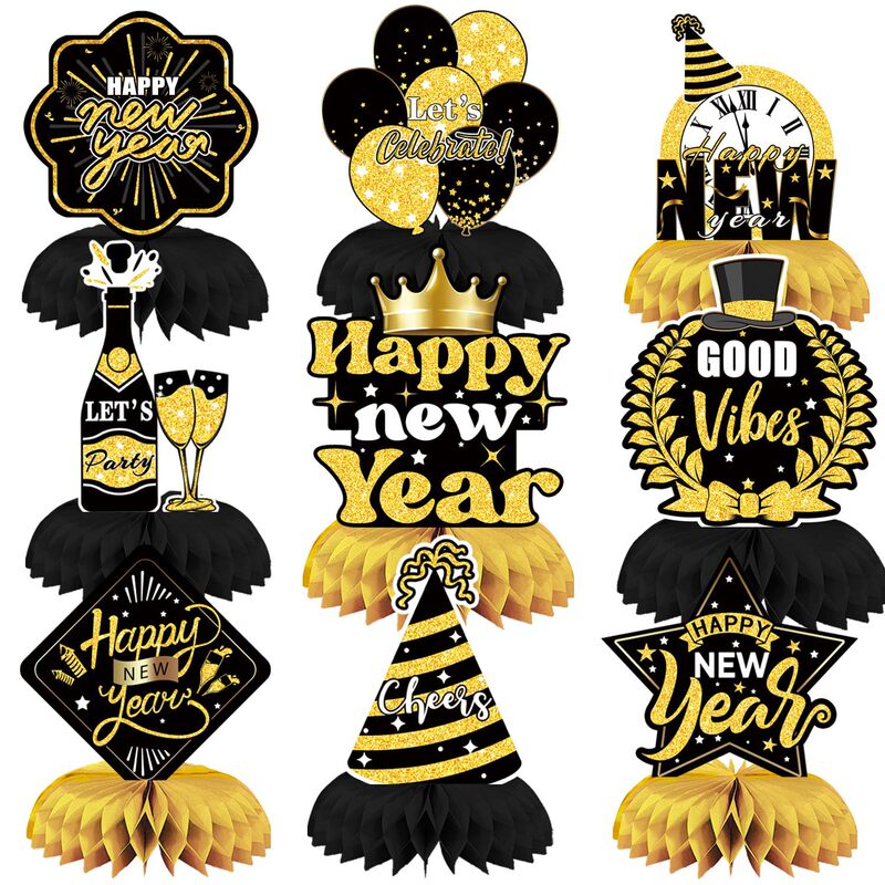 Cross-border New Year's Eve party decorations, including a honeycomb centerpiece and table setting props for New Year's Eve gatherings