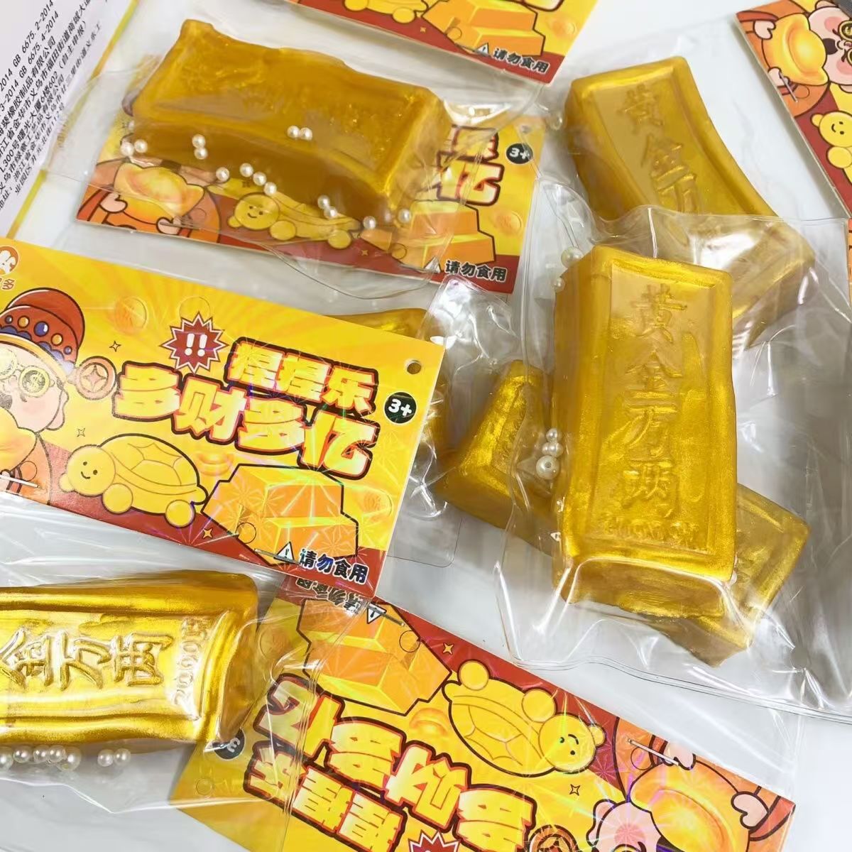 El nuevo juguete de descompresión de barra de oro amasó creativamente el juguete de descompresión de niños amasó la descompresión para desahogar la caja completa de juguetes de rebote lento al por mayor.