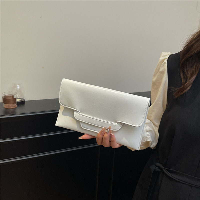 Bolsa de cena de alta calidad de color sólido universal moda de mujer ocio de gran capacidad temperamento personalidad bolso de cambio bolso de mano