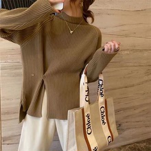秋冬新款針織套頭打底衫網紅側開叉半高領寬松紐扣設計感毛衣女裝