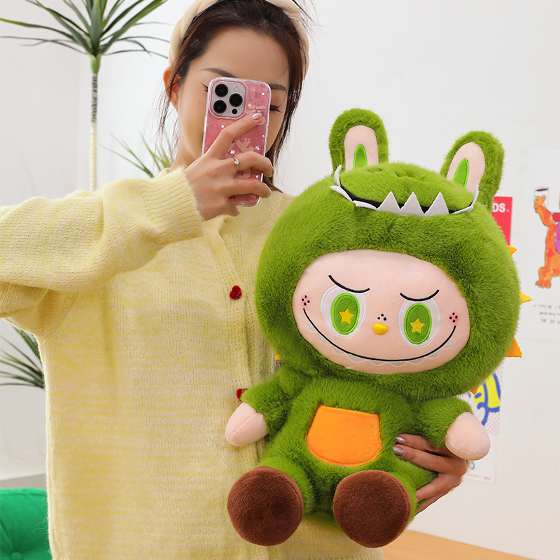 新しいミンクのぬいぐるみぬいぐるみ人形が恐竜の誕生日プレゼントに変身しました。|undefined