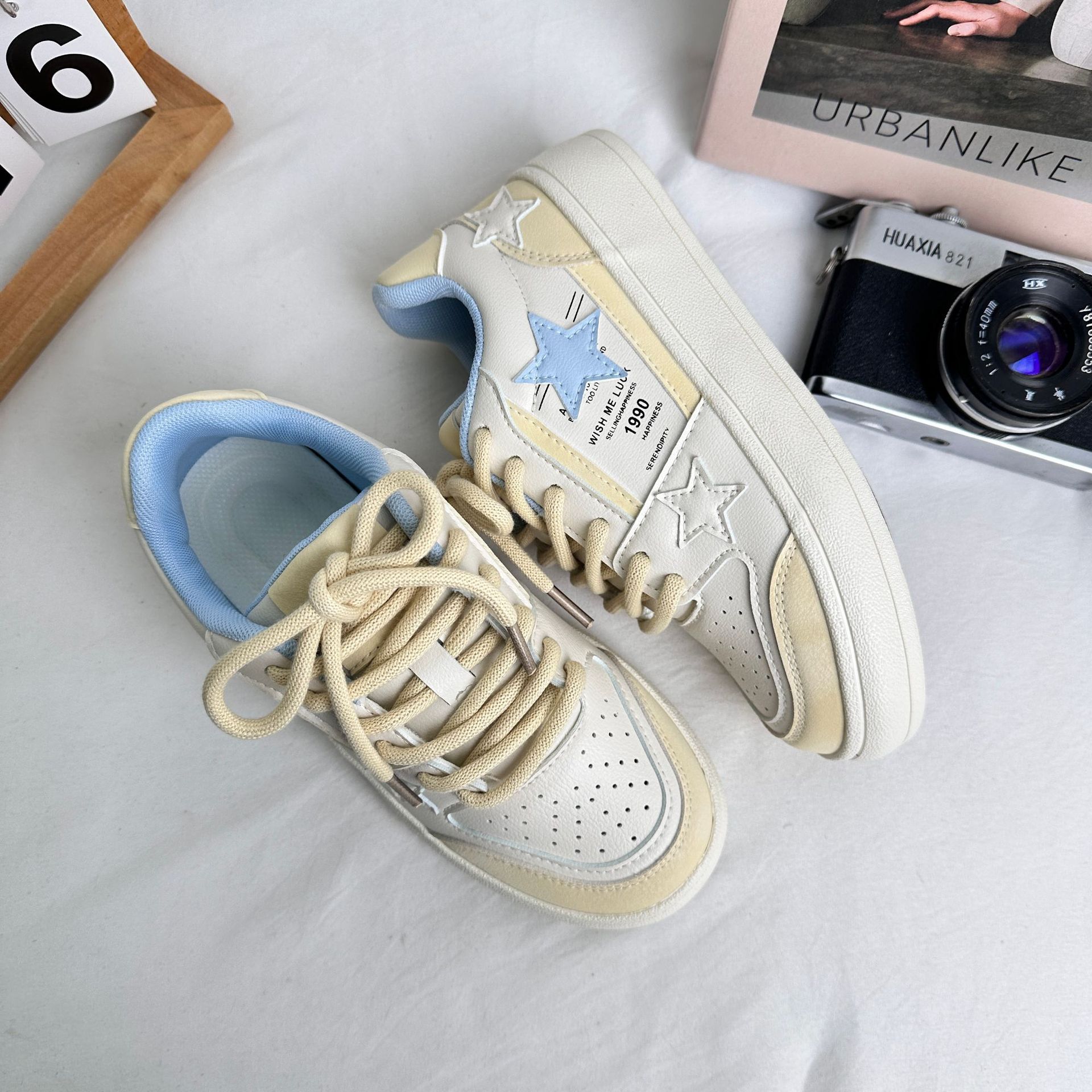 Zapatos de lona de estrellas de onda lejana para mujer 2025 primavera nuevo estilo de estudiante zapatos de lona deportivos casuales de todo fósforo