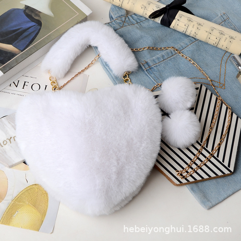 Fabricante en stock bolsa de corazón de melocotón portátil moda felpa en forma de corazón bolsa de peluche bolso de las mujeres