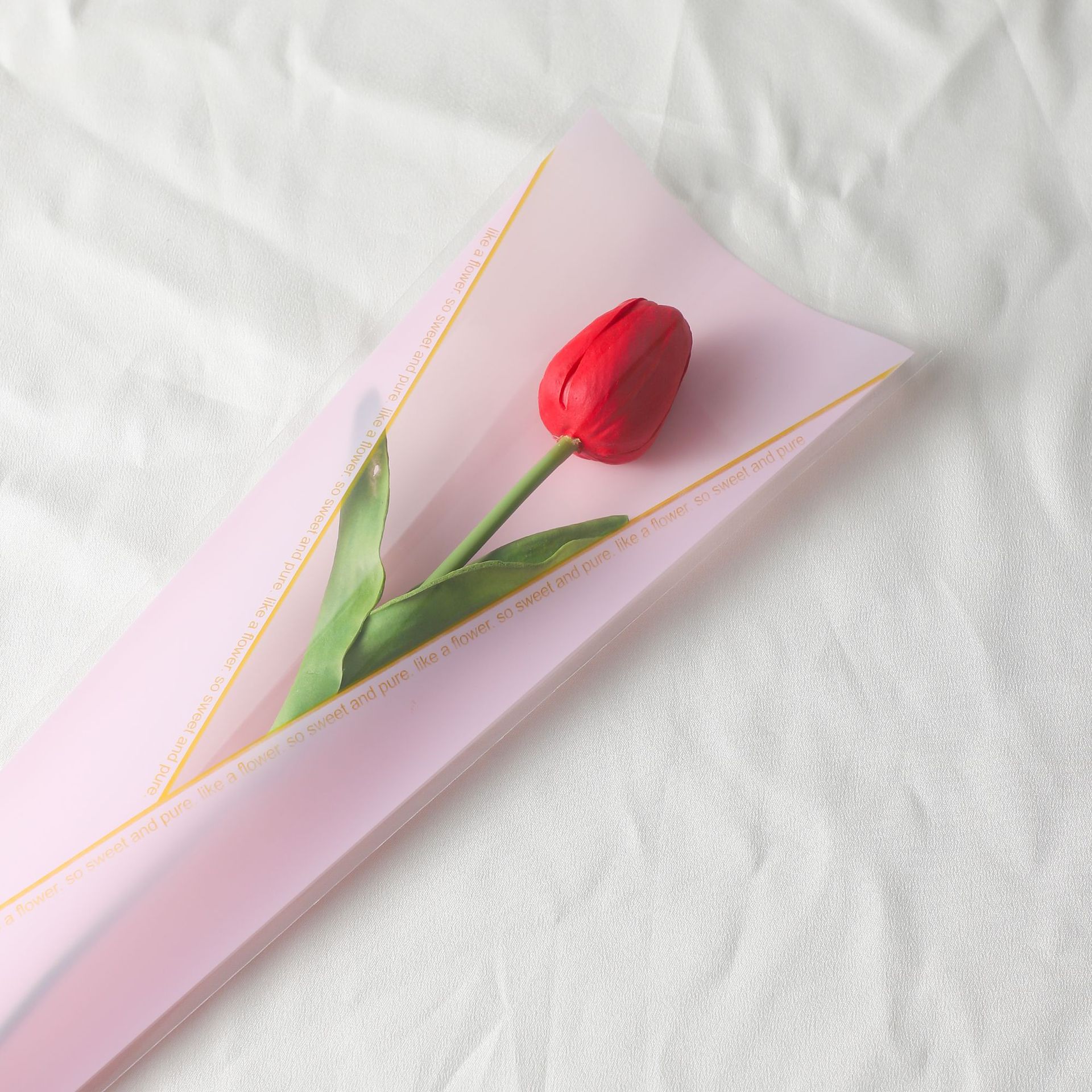 Festival de los maestros de Qixi triángulo de oro translúcido bolsas de rosas individuales embalaje de flores materiales de ramo