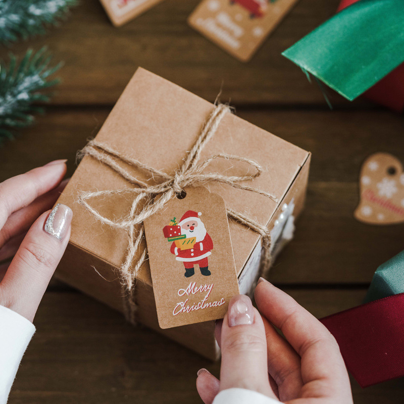 現物アマゾンのクリスマス装飾タグを厚くして、サンタクロースのクリスマスプレゼント装飾カードを印刷します。|undefined