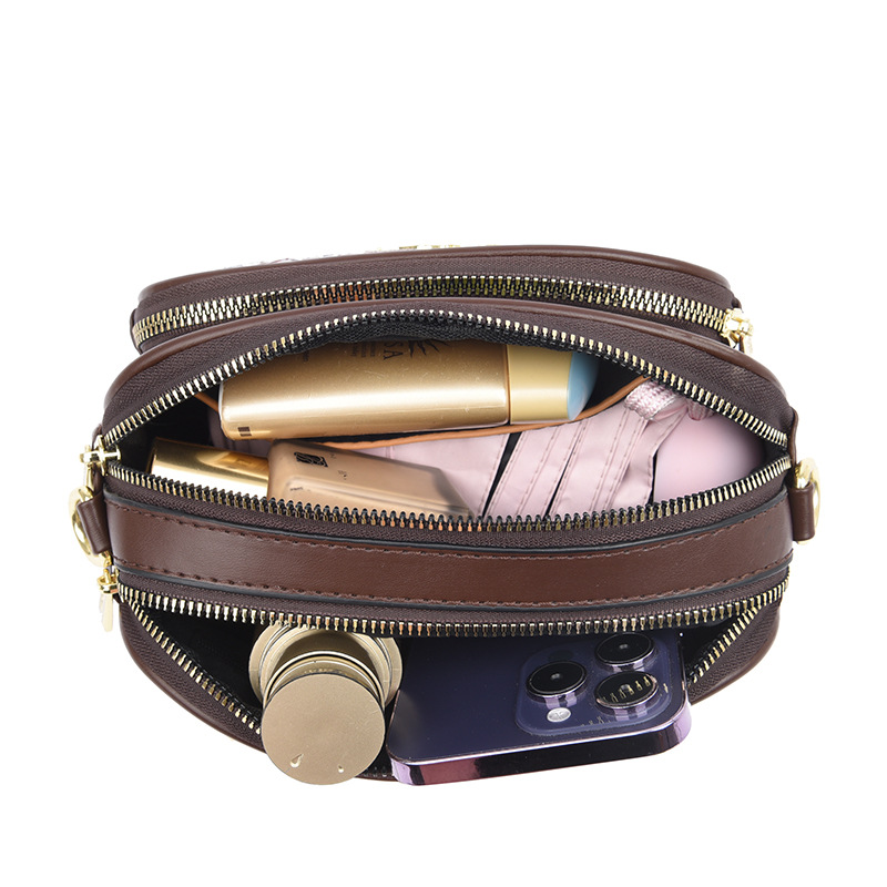 2024 nuevo bolso femenino con cremallera bandolera bandolera exquisito y conveniente, simple, elegante, tendencia, bolso de teléfono móvil de moda versátil