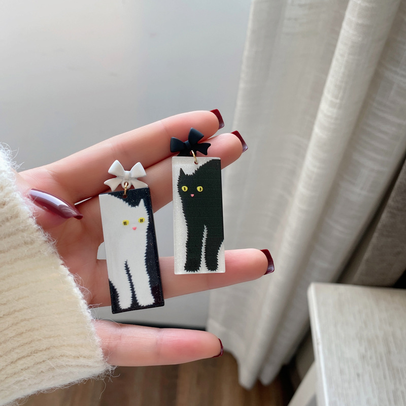 Korean style bow black white cat earrings