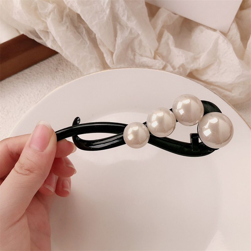 Clip de perla simple detrás de la cabeza de alto nivel de torsión de torsión de clip de cabello grande más temperamento retro tarjeta de cabello de disco