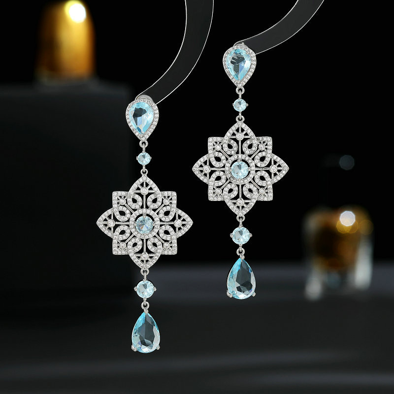 Light luxury high-end heavy industry earrings banquet dress with long hollow pattern water drop earrings_voghion.com