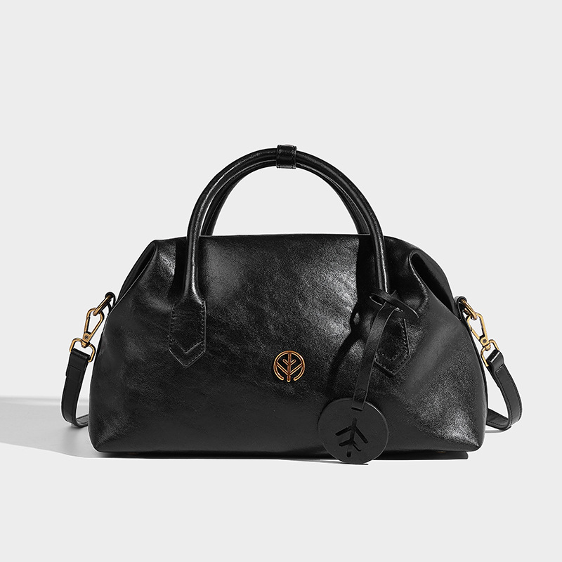 Bolsos de Boston de piel bronceada vegetal retro bolsos de bolera portátiles bolsos de mujer otoño e invierno 2024 nuevos bolsos de Usnea de hombro único