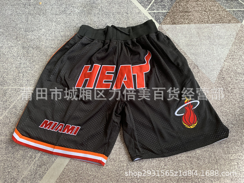 Comercio exterior pantalones de fútbol al por mayor Warriors Lakers 76 caliente Raptor mágico bolsillo bordado pantalones cortos pantalones de baloncesto NFL
