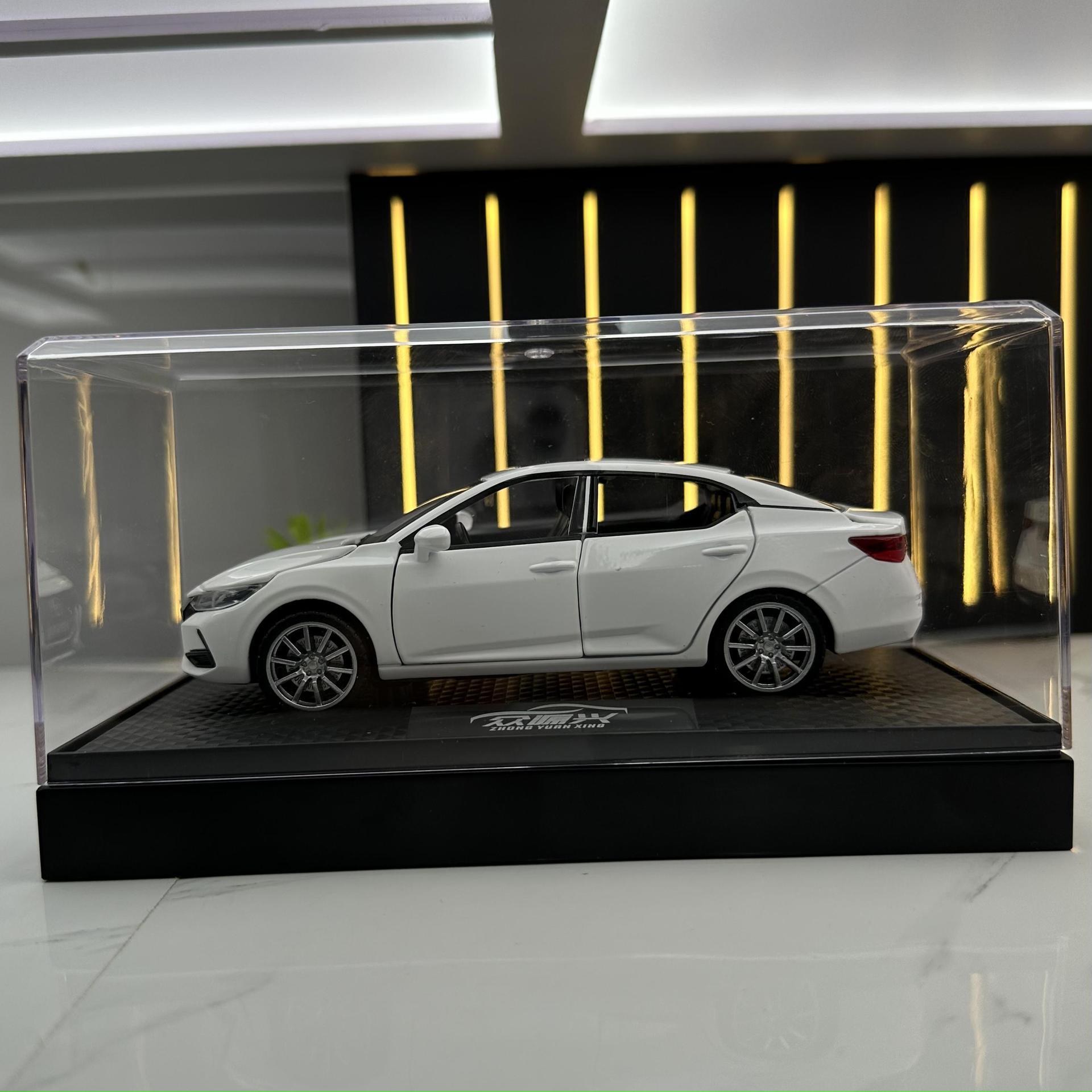 Zhongyuan xinghejin modelo de coche 1:32 Nissan Xuanyi sonido y luz Tire hacia atrás coche de juguete modelo de música decoración caja de polvo