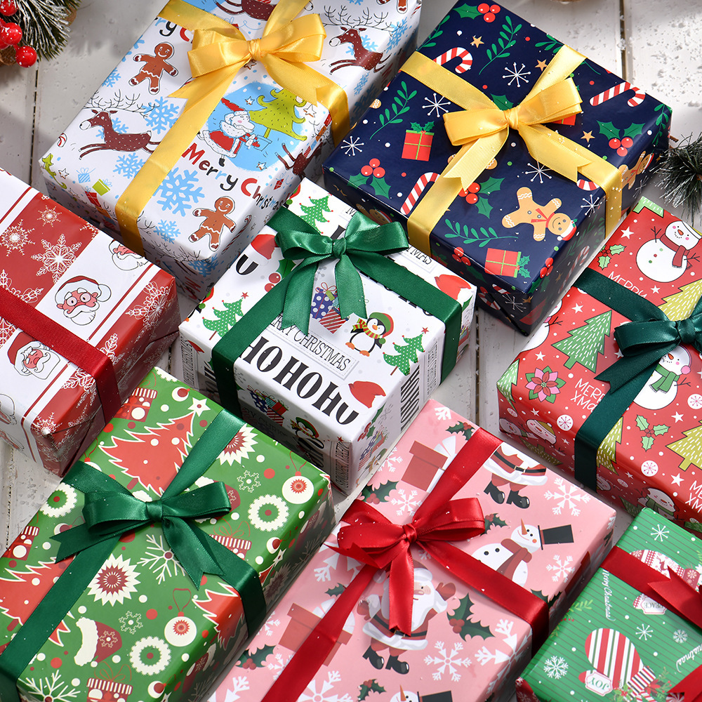 Nuevo papel brillante de bronce transfronterizo papel de embalaje de regalo de Navidad Papá Noel dibujos animados árbol de Navidad diy papel de regalo