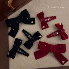 韓国系の子供の暗い赤い質感のベルベットは金布芸の蝶結びのヘアピンの女の子にアイロンをかけます。