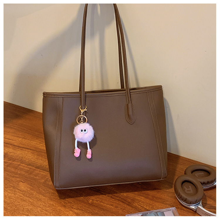 Bolso de mano texturizado estilo commuter para comercio exterior, nuevo bolso versátil estilo coreano para otoño e invierno 2025, bolso elegante tipo tote.