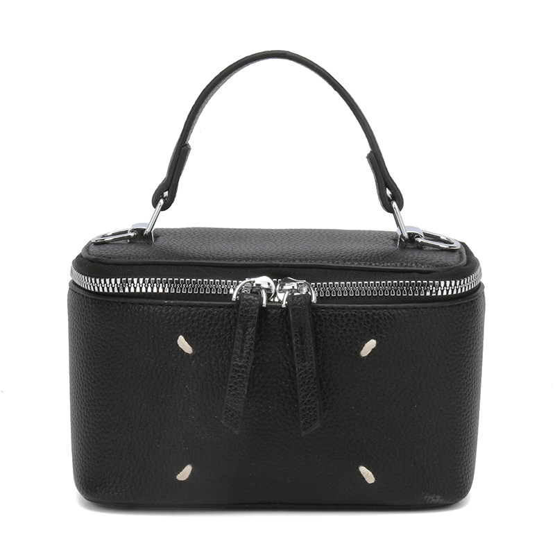 Bolso de caja de estilo occidental de color puro para mujer 2025 nuevo bolso cuadrado pequeño de moda de moda bolso de lonchera de mensajero de un solo hombro de sentido de alta gama