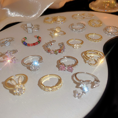 Korean-style zirconia ring for women, simple open-mouth pearl finger ring with adjustable fashion and personalized hand jewelry for wholesale.