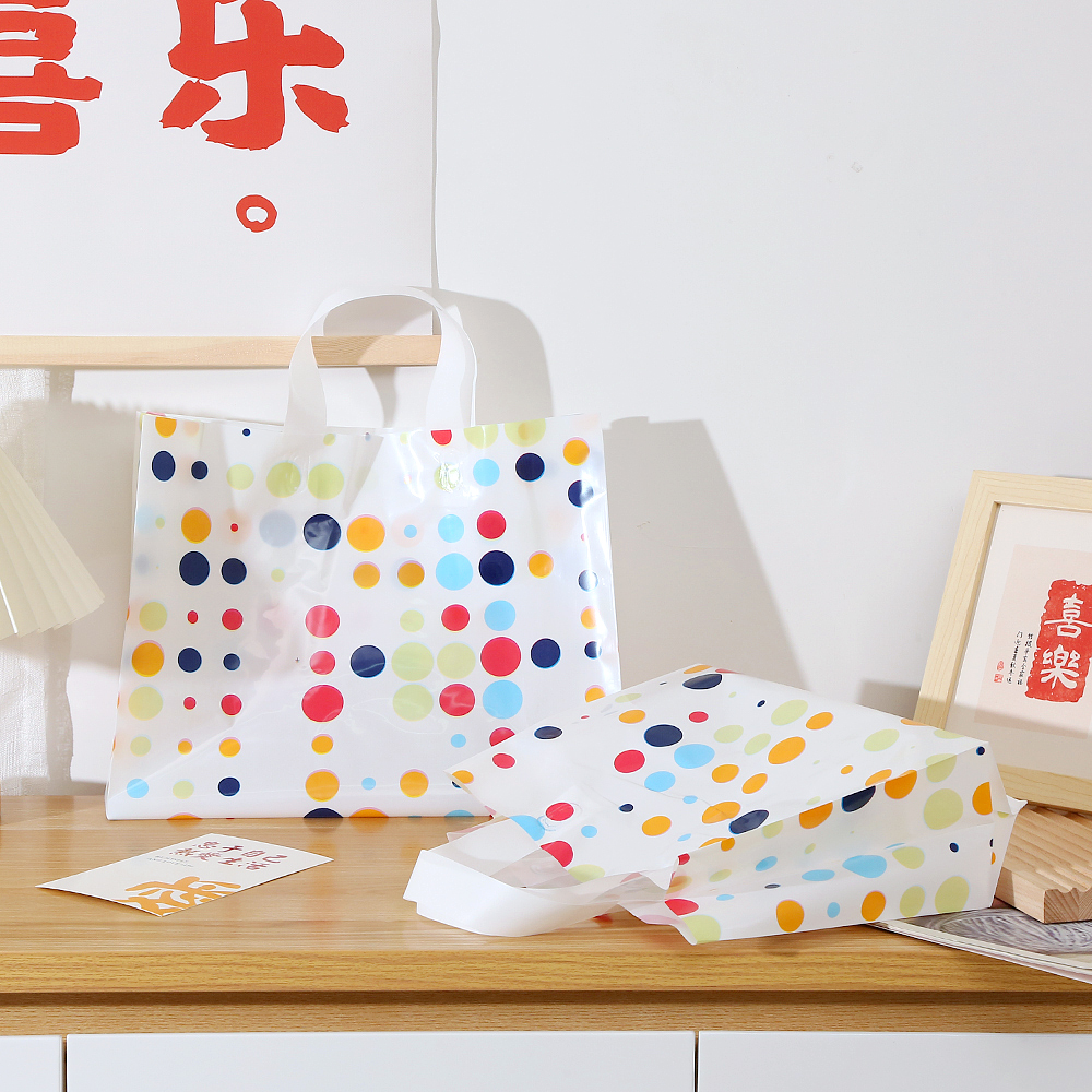 Bolsas de regalo de plástico personalizadas impresión logotipo bolsas de ropa personalizadas bolsas de goma de compras ropa de mujer portátil