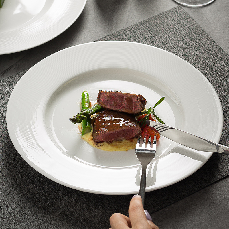 White Porcelain Steak Dinner Plate High-grade Sense Pizza Plate French Restaurant Dish Plate Home Breakfast Plate Hotel Special Western Food Plate White Porcelain Steak Dinner Plate High-grade Sense Pizza Plate French Restaurant Dish Plate Home Breakfast Plate Hotel Special Western Food Plate