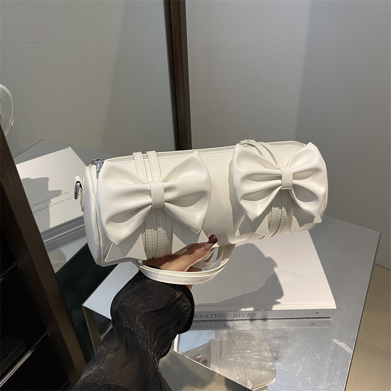 Bolsos debajo de las axilas de la mujer 2024 nuevo estilo de diseño de moda nicho bolso de arco bolso de mano