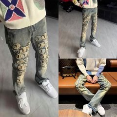 ファッションブランドの新型パッチの小さい足の刺繍のまっすぐな筒のズボンのカジュアルな男性のジーパンの個性の潮流は身を修める弾力のズボンです。