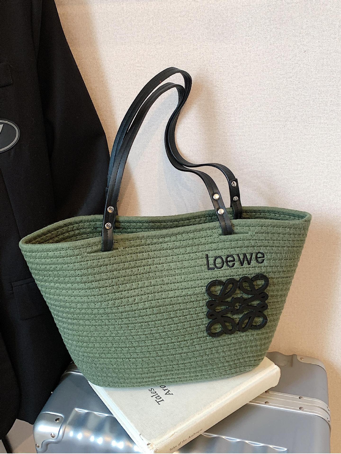 Bolso tejido femenino de gran capacidad 2025 verano nuevo bolso de playa de vacaciones junto al mar estilo de viaje bolso tejido de paja portátil