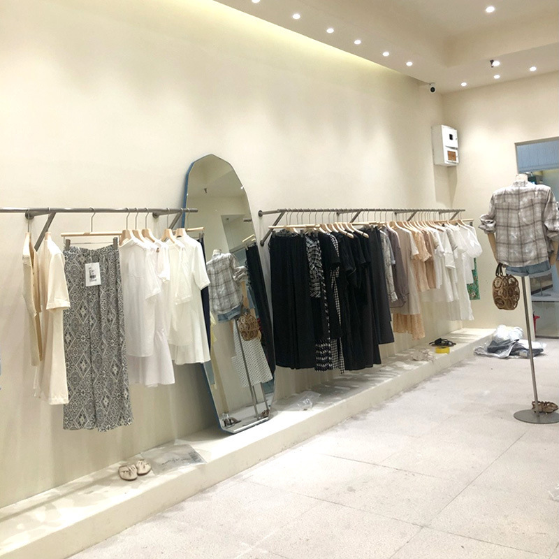 服装店不锈钢上墙挂衣杆男女童装店货架展示架网红斜撑衣架陈列架