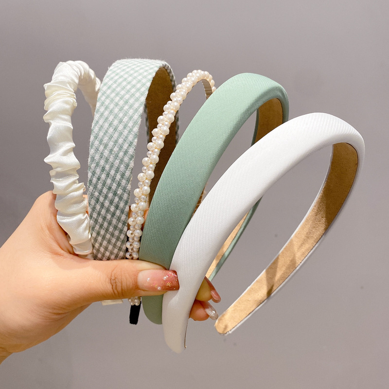 A principios de la primavera, la banda de cabello para mujeres en línea, 2025 nuevo lavado de cara de presión de tarjeta de cabello para el cabello, banda de cabello de perlas, banda de cabello para mujeres.