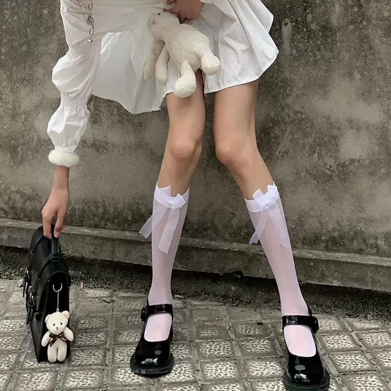 White black tights with bow, high boots, mid-length