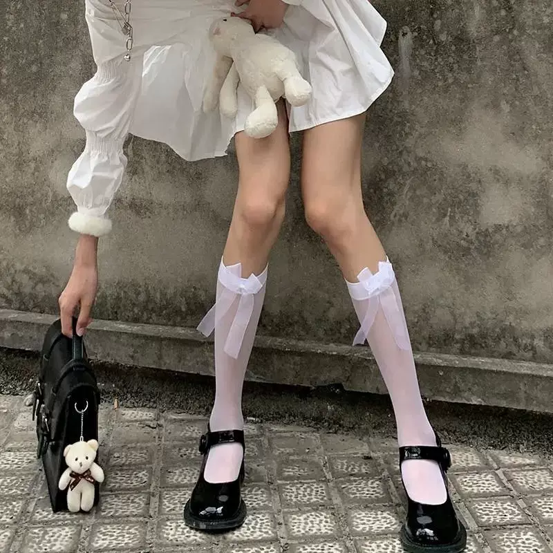 White black tights with bow, high boots, mid-length