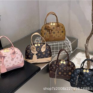 莫妮卡奇奇 Advanced Ms. Ms. Practice Laohua contrasting shell bag 2024 new fashion light luxury niche