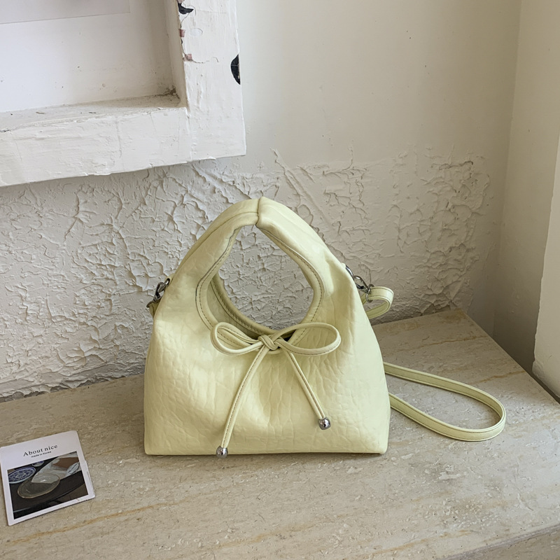 Bolsa de mano de arco dulce coreano, exquisito cinturón de nubes, bolso de mochila encantador, fresco y versátil, bolso de moda