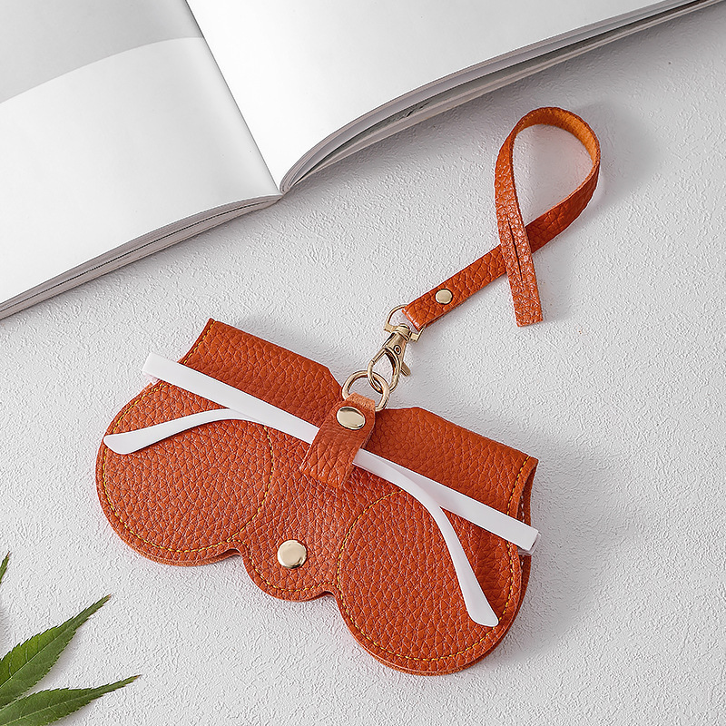 Nuevo paquete de gafas de sol portátiles bolsa de almacenamiento de gafas de sol estuche de gafas con patrón de lichi cuello colgante gafas de cuero cubierta protectora