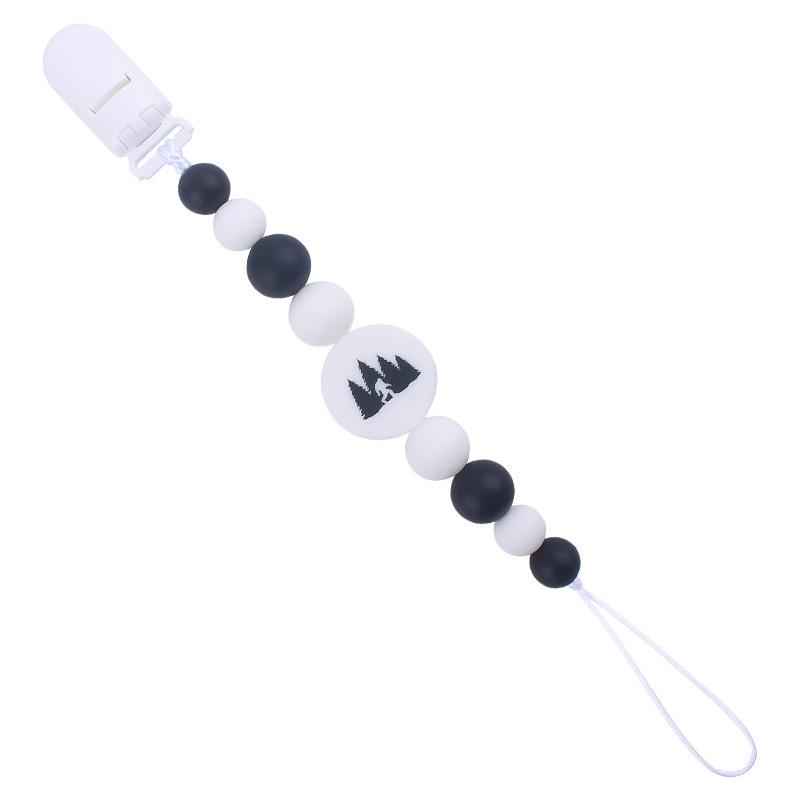 Nuevo bebé suministros de dibujos animados de impresión redonda amor creativo DIY silicona mordedura molar pezón cadena anti-caída