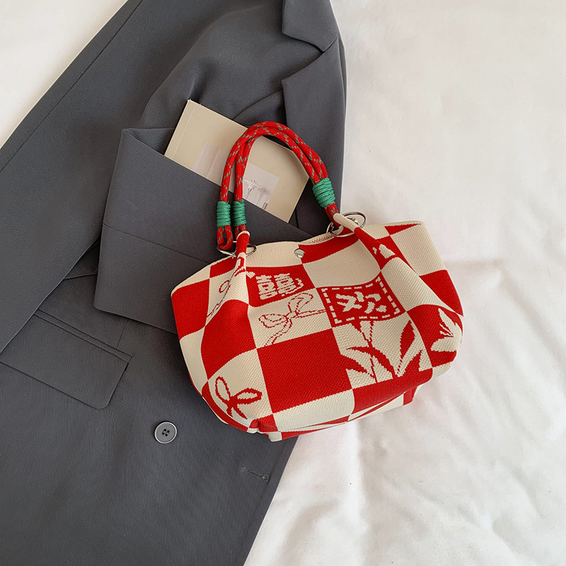 Bolsa de impresión coreana de niña nicho bolso de cubo de diseño diario versátil bolso de mano para estudiantes de viaje diario