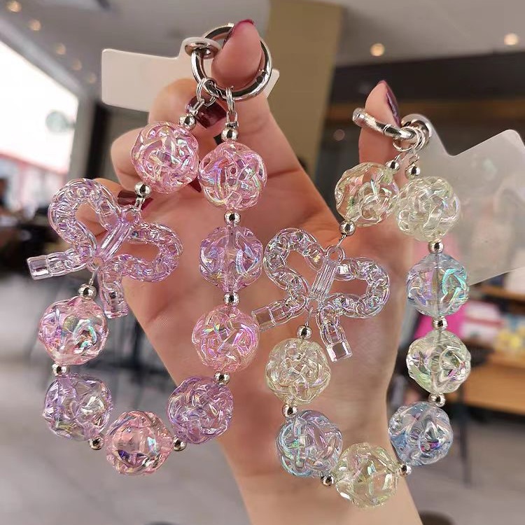 Colgante de teléfono móvil corto colgante de muñeca red rojo patrón delicado arco colgante de cuentas caja de teléfono móvil anti-perdida universal