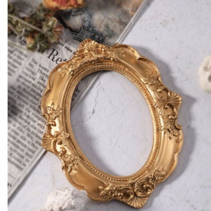 황금 타원형 사진 프레임