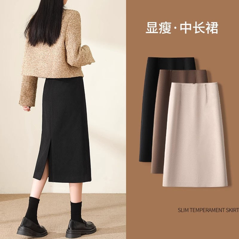 カレー色のa字の半身のスカートの女性の秋のハイウエストはやせているストレートのスーツのスカートの高級感の包みのお尻の中の長いタイプのオープンスカートを現します。|undefined