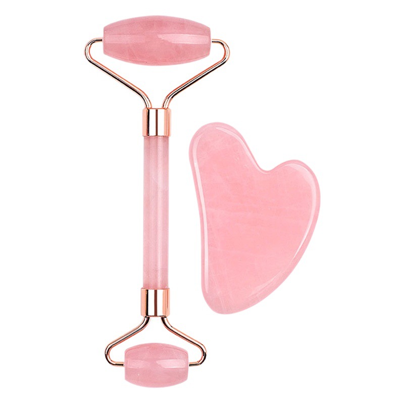 El masajeador de rodillo de jade de cristal rosa de doble cabezal más vendido de Amazon, conjunto combinado de masaje facial y ocular con forma de corazón y gua sha.