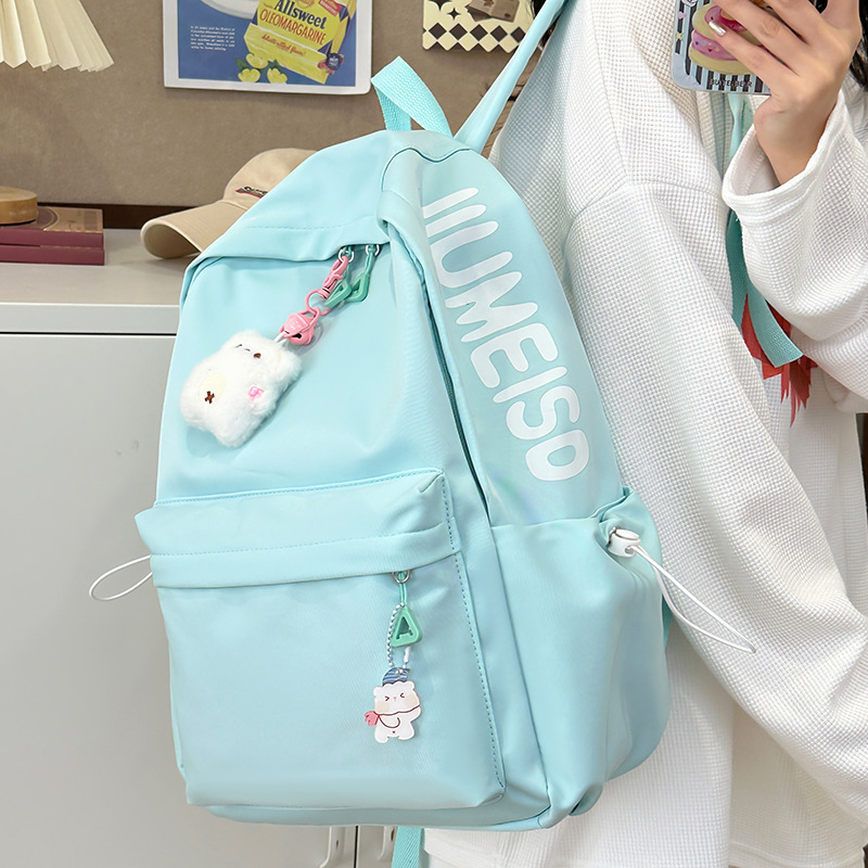Mochila de gran capacidad para estudiantes de secundaria femenina simple y versátil para estudiantes de secundaria japonesa mochila de diseño